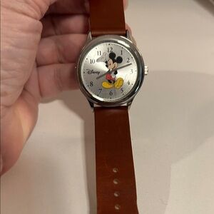 Mickey Mouse watch by Disney. Brown leather band with man made backing